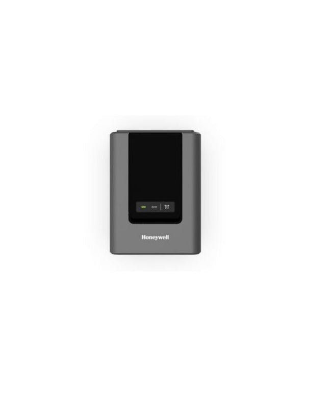 Honeywell PC42E-TB02200 black printing calculator for office use, featuring keypad and digital display in a professional workspace