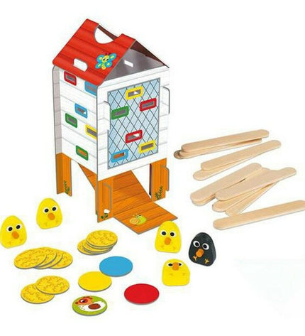 Goula Happy Chicken baby agility game with colorful wooden pieces and chicken-shaped design for young children.