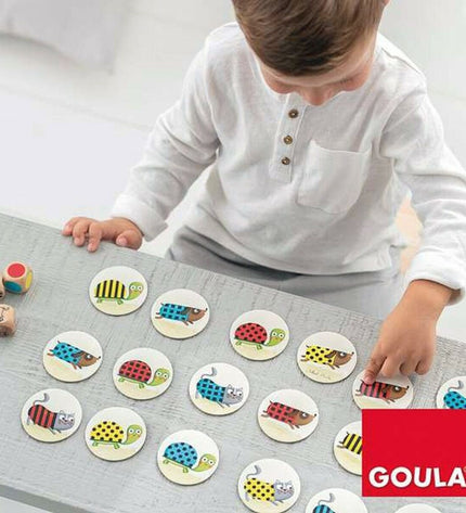 Goula Catch it educational game with colorful plastic pieces and game components for children’s learning and fun.