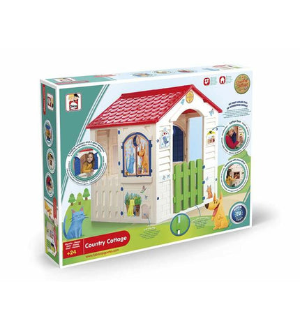 Chicos Country Cottage playhouse for children, outdoor toy with windows and door, measuring 84x103x104 cm, in a garden setting.