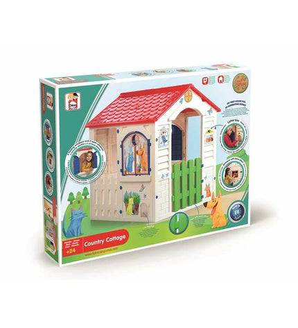 Chicos Country Cottage playhouse for children in outdoor setting, featuring windows, door, and colorful exterior design.