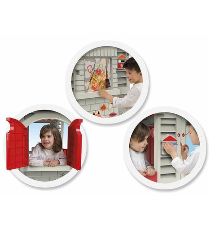 Chicos Grand Cottage XL playhouse for children, outdoor toy house with windows and door, ideal for kids' outdoor play.