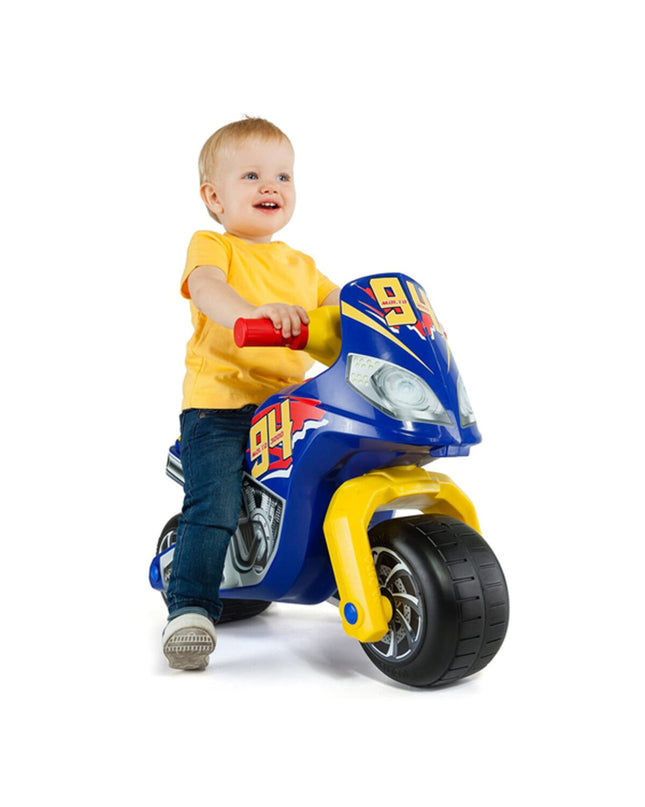 Blue Moltó motocross tricycle for children aged 18 months and up, designed for outdoor play and active fun.