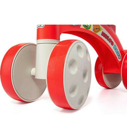 Red Moltó tricycle for children, outdoor toy and sport equipment, with sturdy frame and safety features.