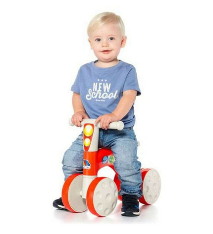 Red Moltó tricycle for children, featuring sturdy wheels and a comfortable seat, ideal for outdoor play and sports activities.