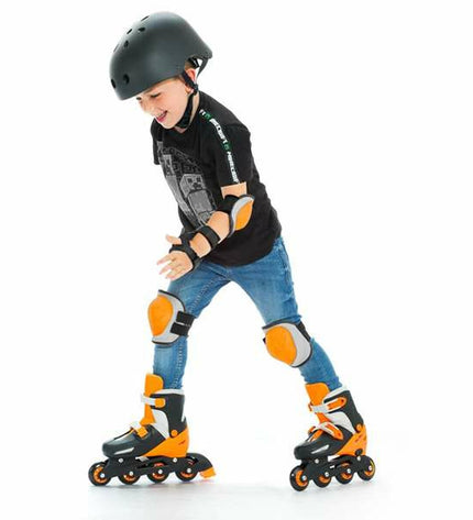 Moltó orange adjustable inline skates for kids, size 35-38, featuring bright orange boots and inline wheels for outdoor fun.