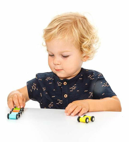 Wooden race track with ramps for toy cars by Moltó, featuring colorful wooden construction and multiple levels for racing fun.