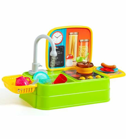 Moltó toy kitchen set with colorful plastic utensils and appliances for imaginative play in a children's play area.