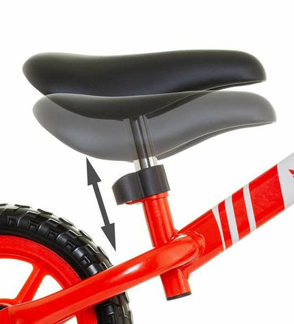 Red Moltó Kinderfiets for children, featuring a sturdy frame and colorful design, ideal for outdoor play and active fun.
