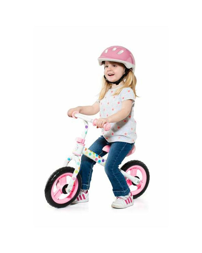 Pink kids' balance bike by Moltó, designed for young children, with a sturdy frame and no pedals for outdoor play.