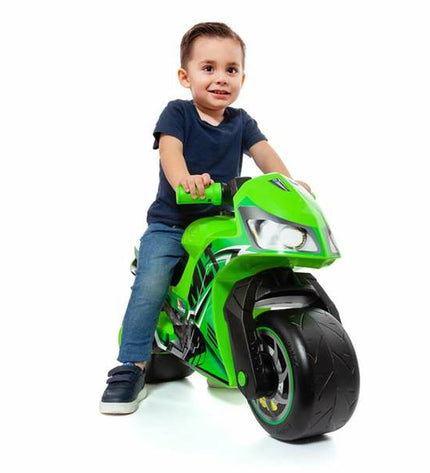 Moltó Loopmotor Moltó Premium Groen toy scooter with green body, black handlebars, and wheels, ideal for outdoor play.