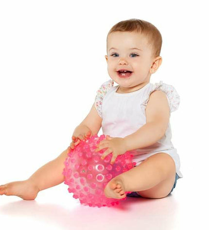 Pink Moltó sensory ball for babies, 20 cm soft, textured toy designed for young children’s play and sensory development.
