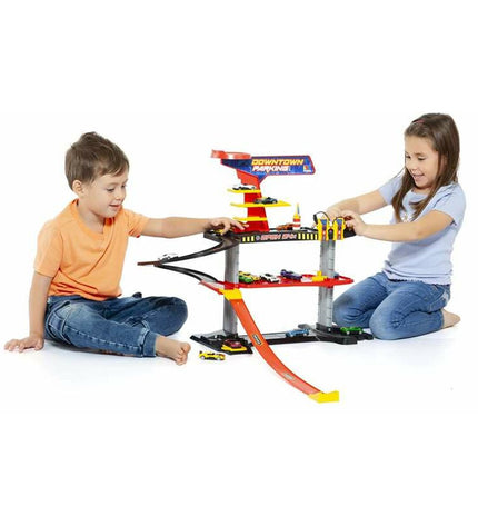 Toy parking garage by Moltó with colorful vehicles and ramps, designed for children to enjoy imaginative play with toy cars.
