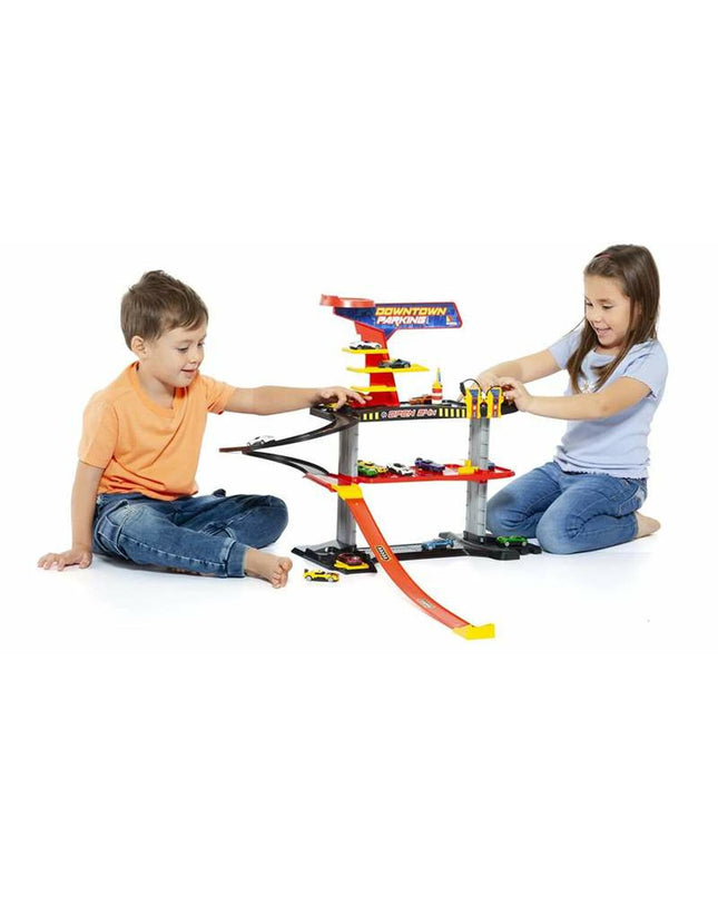 Toy parking garage by Moltó with colorful vehicles and ramps, designed for children to enjoy imaginative play with toy cars.