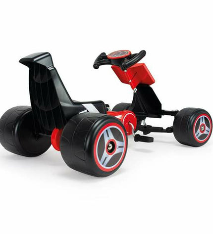 Injusa Vrachtwagen speelgoed voertuig with detailed design, orange and black colors, suitable for children, in a playful setting