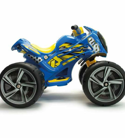 Injusa Flames 6V electric quad toy for kids, shown outdoors, with 87x70x58 cm size and vibrant flame design.
