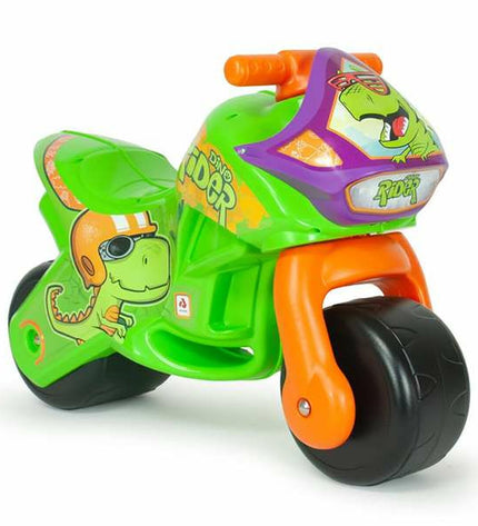 Injusa Loopmotor toy scooter for outdoor play, colorful plastic ride-on vehicle for kids in a grassy outdoor setting.