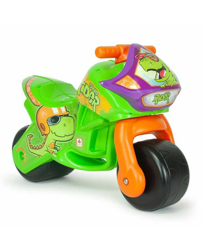 Injusa Loopmotor toy scooter for outdoor play, colorful plastic ride-on vehicle for kids in a grassy outdoor setting.