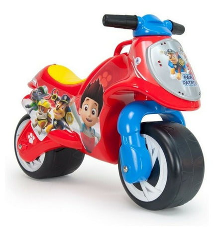 Paw Patrol ride-on tricycle for children 18+ months, red and blue plastic toy bike with Paw Patrol logo and character decals.