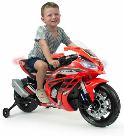 Injusa Honda CBR toy motorcycle for children, detailed plastic ride-on vehicle in red with black accents and realistic design.