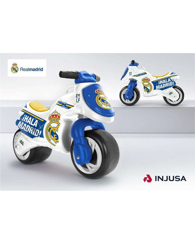 Loopauto of Real Madrid C.F., a toy sports car in red with team logo, measuring 69 x 27.5 x 49 cm, for children’s outdoor play.