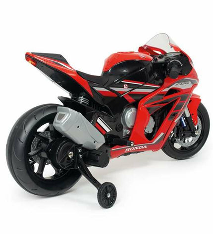 Injusa Driewieler toy bike for kids, colorful plastic with training wheels, designed for outdoor play and sport activities.