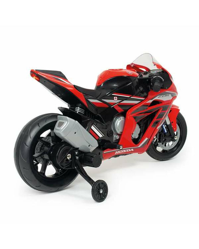 Injusa Driewieler toy bike for kids, colorful plastic with training wheels, designed for outdoor play and sport activities.