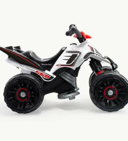 Injusa electric quad toy in white with multicolour accents, suitable for outdoor play and sports activities.