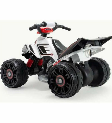 Injusa electric quad bike for kids, white with multicolour accents, outdoor toy suitable for sports and outdoor play.