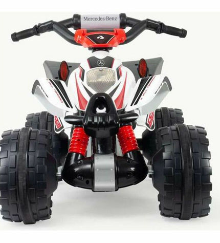 Injusa electric quad toy in white with multicolour accents, suitable for outdoor play and sports, designed for children.