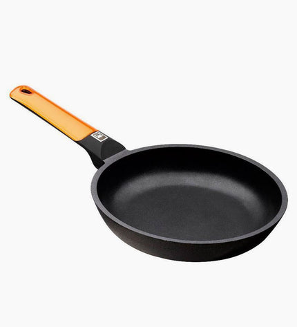 Black and orange BRA aluminium pan with 20 cm diameter, ideal for house and kitchen use, shown from top angle.