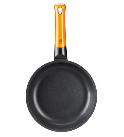 Black and orange BRA aluminium pan with a 20 cm diameter, suitable for home cooking and kitchen use.