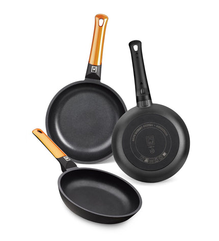 Black and orange BRA hard-anodized aluminum pan with a 20 cm diameter, suitable for cooking and kitchen use.