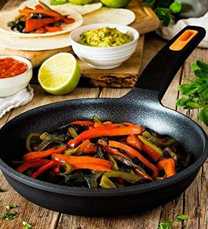 Black BRA Efficient Plus 26 cm aluminum frying pan with non-stick surface, ideal for versatile cooking in the kitchen.
