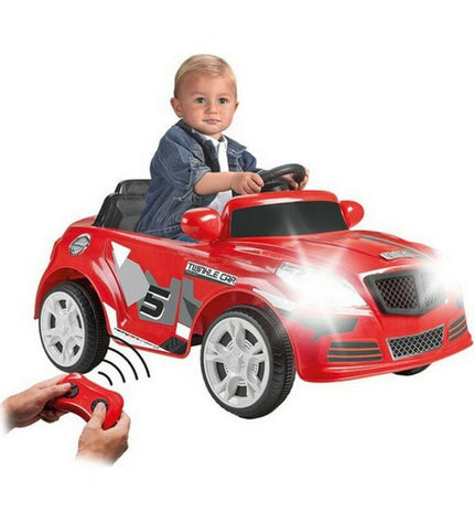 Feber elektrische speelgoedauto voor kinderen, zwart en rood met veilige zit en stuur, geschikt voor buiten spelen.