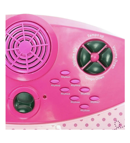 Pink Hello Kitty electronic piano for children, colorful toy music instrument with playful Hello Kitty design and keys.