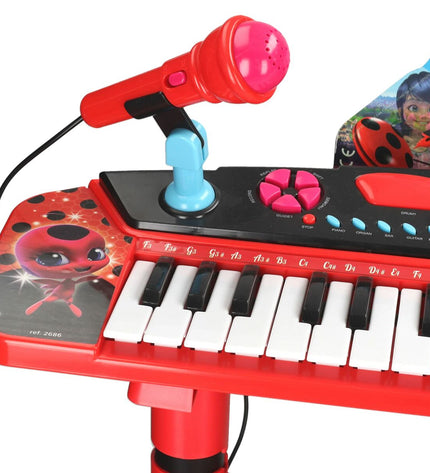 Lady Bug electronic toy piano for kids, colorful musical instrument with keys and playful design, suitable for children’s entertainment.