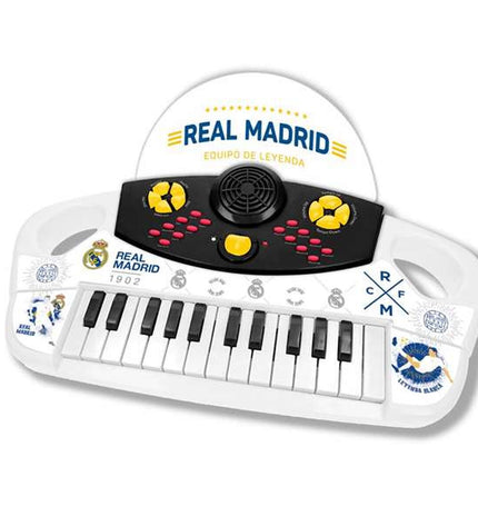 Colorful Real Madrid C.F. toy piano for kids, featuring team logo and musical keys, perfect for young football fans.
