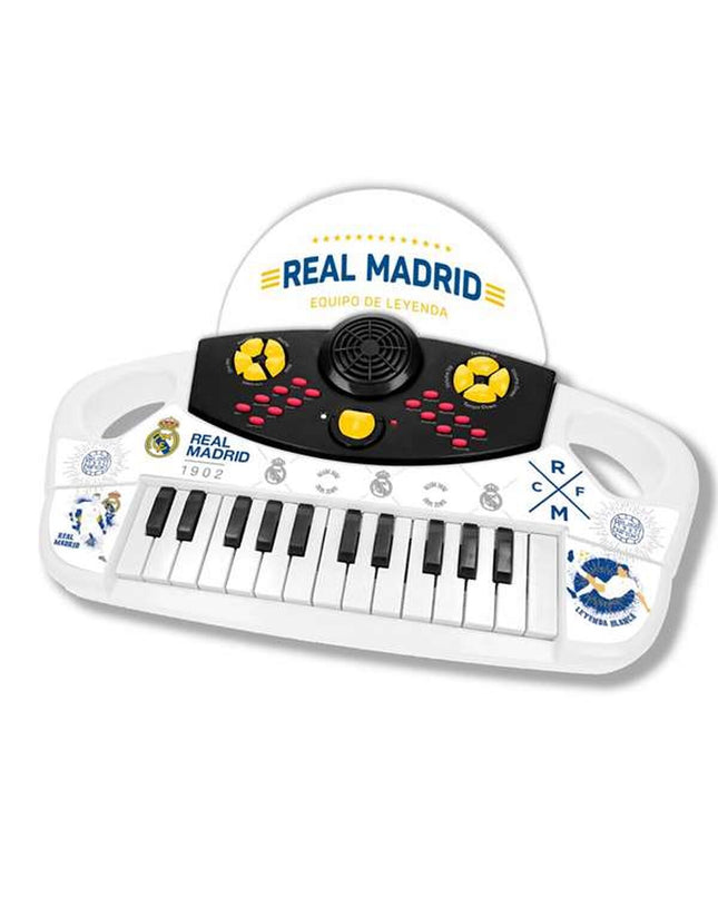 Colorful Real Madrid C.F. toy piano for kids, featuring team logo and musical keys, perfect for young football fans.