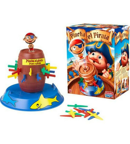 Falomir Pincha el Pirata board game with colorful pirate-themed pieces and game components on a table.