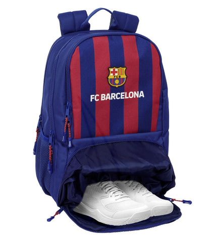 F.C. Barcelona paddle tennis sport and outdoor backpack in kastanjebruin and marineblauw with branded logo and multiple compartments.