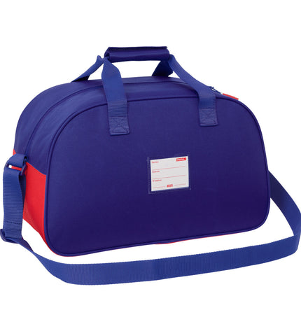 Atlético Madrid sports bag in blue, white, and red with dimensions 40x24x23 cm, designed for outdoor and sport activities.