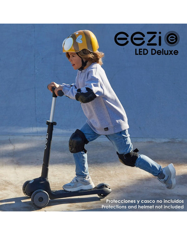 Black aluminium scooter from Colorbaby, suitable for urban mobility and outdoor sports, with a sleek, modern design.