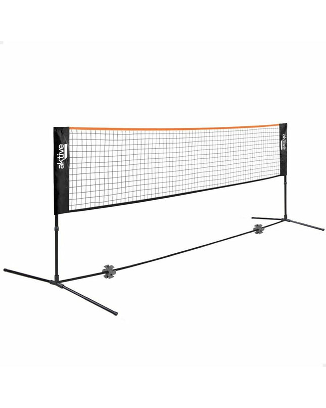 Red Aktive badminton sport and outdoor net measuring 505 x 157 x 101 cm, set up outdoors with the net and support poles visible.