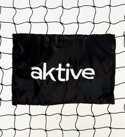Black Aktive soccer goal for outdoor sports, with sturdy frame and net for playing football in the yard or field.