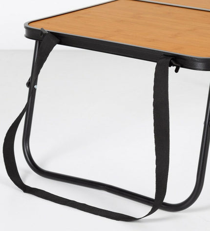 Aktive black foldable table for camping and outdoor activities, measuring 60x25x40 cm, with a sturdy portable design.