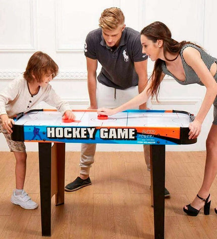 CB Games hockeytafel with 122x61x75 cm dimensions, featuring a sleek design for fun table hockey gameplay.