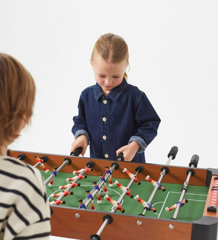 CB Games foosball table, 91x65x46 cm, toy game with detailed players, rods, and scoring system for tabletop fun.