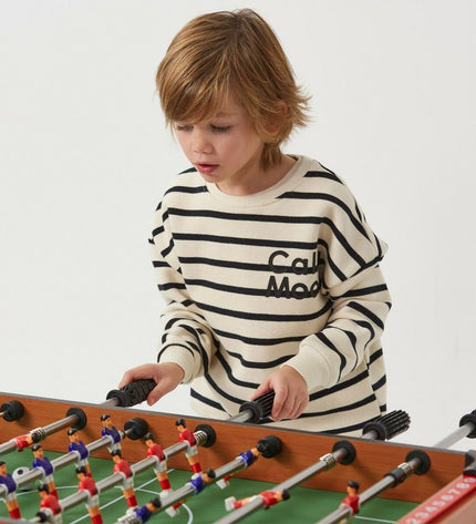 CB Games table football toy, 91 x 65 x 46 cm, with colorful players and rods for fun indoor game.
