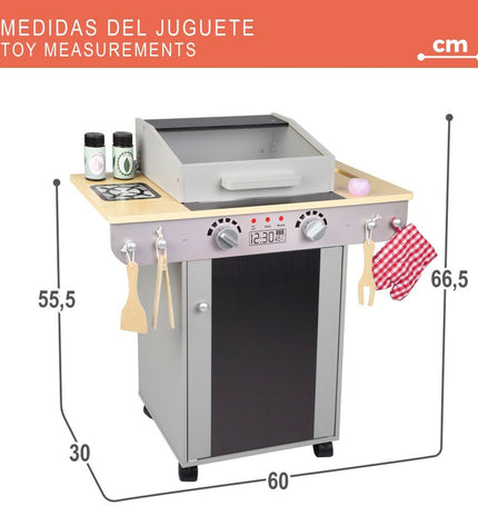Teamson toy play kitchen BBQ set with stove, utensils, and accessories in a colorful pretend kitchen scene.